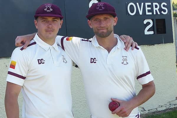 Brothers Greg and, right, Michael Fenton celebrating their twin achievements against Haddington, the former scoring 83 runs and the latter picking up five wickets for just five runs (Photo: John Smail)
