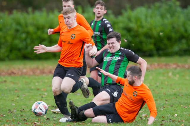 Hawick United's Adam Beattie winning the ball against Greenlaw in their South of Scotland Cup second-round tie on Saturday (Photo: Bill McBurnie)