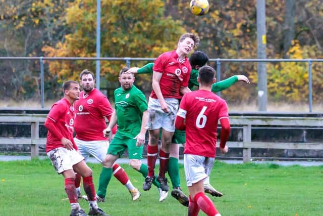 Fraser Stewart winning a header for Peebles Rovers versus Edinburgh South at home on Saturday (Pic: Pete Birrell)