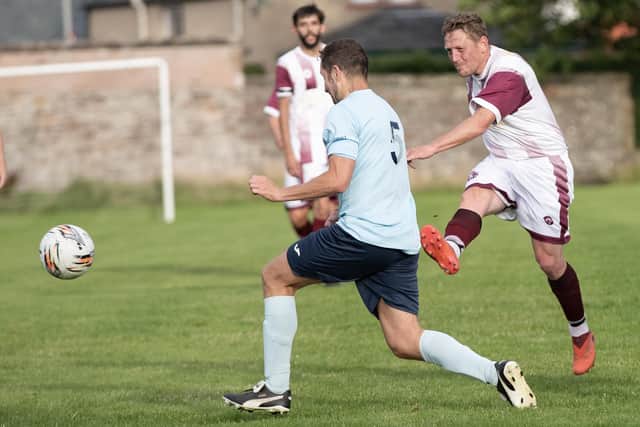 Des Sutherland scoring one of his two goals for Langlee Amateurs during their 9-0 pre-season friendly victory against Gala Hotspur at Galashiels Public Park last Thursday (Photo by Brian Sutherland)