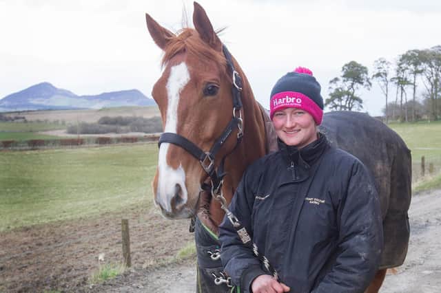 Amy Coltherd with Dequall, a 2016 Chestnut Gelding.