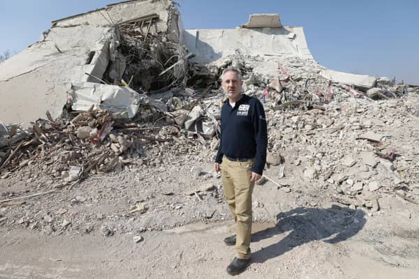Selkirk's Erlend Linklater at one of the many demolished buildings in Turkey. Photo: Russell Wakins/FCDO.