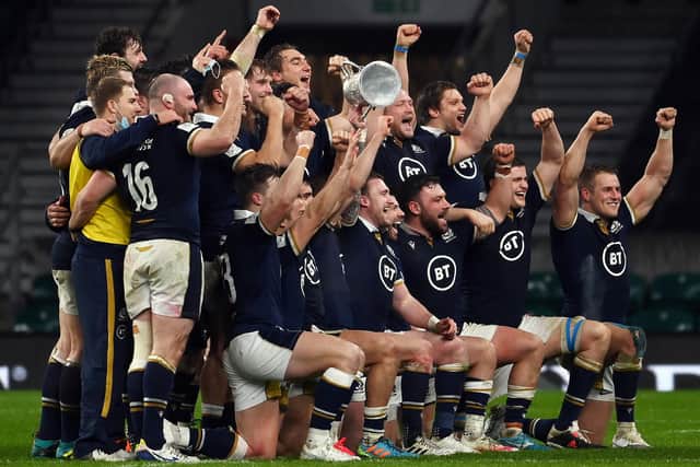 The Scotland rugby team celebrating their victory today. (Photo by Mike Hewitt/Getty Images)