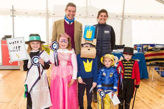 Finalists in the fancy dress competition, Robyn McNulty, Anna Skeldon, Myles McNulty, Reagan Strachan and Sheeran Reid, judged by Jonathan Garratt MD at Kelso Races and Hanna Farrell of the SRA. (Photo: BILL McBURNIE)