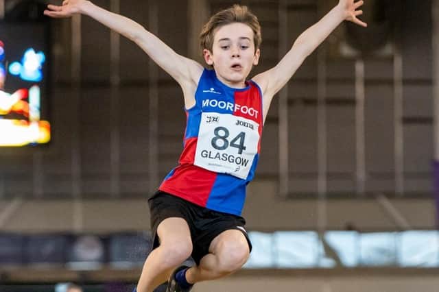 Innerleithen's Robert Horton winning a gold medal for under-13 long jump in Glasgow at the weekend (Photo: Bobby Gavin/Scottish Athletics)