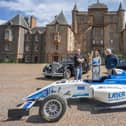 Perth racing driver Chloe Grant, centre, at Thirlestane Castle in Lauder last month to promote the upcoming Sir Jackie Stewart Classic (Photo: Phil Wilkinson)