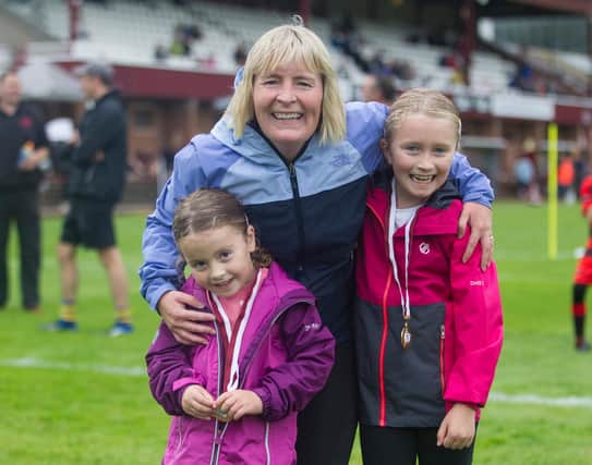 Lisa Jeffcoate with Abbie and Lucy after the fun run. (Photo: BILL McBURNIE)