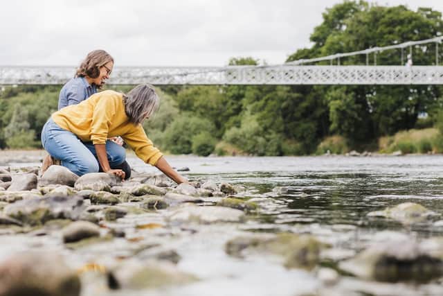 Connecting Threads artists in residence Rebecca Beinart and Savinder Bual by the Tweed in Melrose. (Pic: Pictorial Photography & Create Berwick)