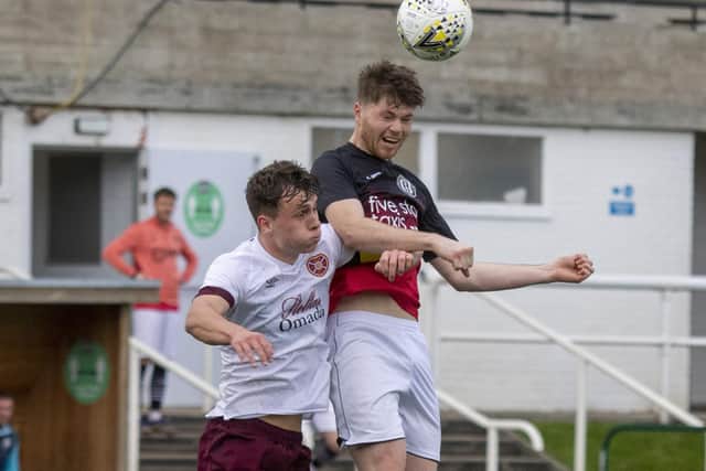 Ciaren Chalmers winning a header for Gala Fairydean Rovers against Hearts B at the weekend (Photo: Thomas Brown)