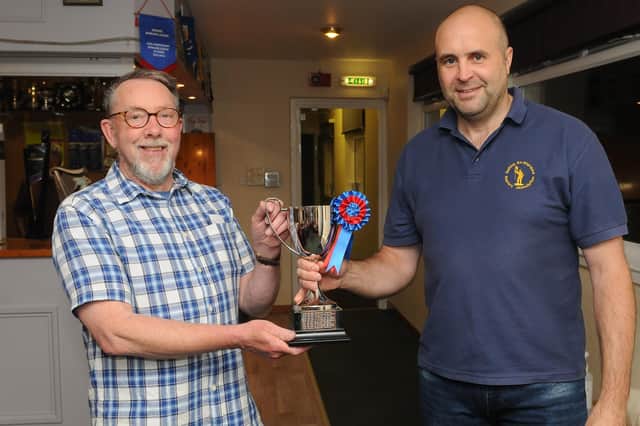Selkirk Merchant Company master Al Pattullo presenting the Shawburn Cup for bowls to Royal and Ancient Burgh Ex-Standard Bearers' Association chairman Gary Guthrie on Friday (Photo: Grant Kinghorn)