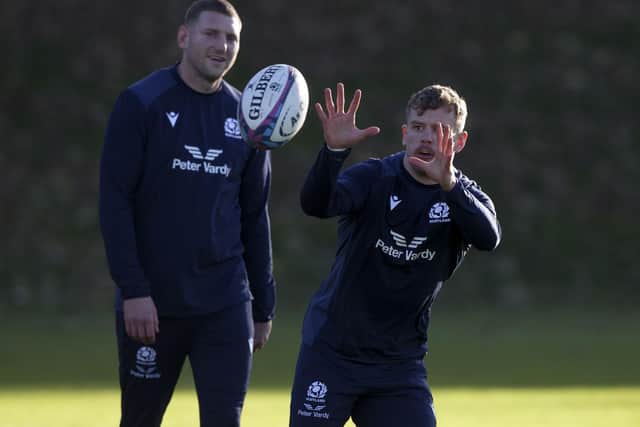 Darcy Graham taking part in a Scotland training session, with Finn Russell looking on, at the Oriam in Edinburgh yesterday (Photo by Craig Williamson/SNS Group/SRU)