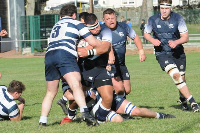 Jake Milburn being tackled during Selkirk's 26-13 loss at home to Heriot's Blues on Saturday (Photo: Grant Kinghorn)