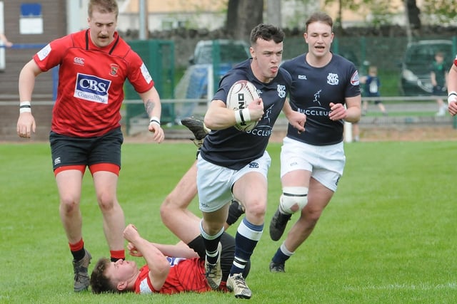 Guy Mallin on his way to scoring a try for the hosts against Linlithgow in round one of Saturday's Selkirk Sevens