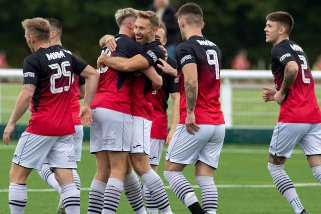 Gala Fairydean Rovers skipper Danny Galbraith (centre) celebrates with team-mates after Rovers scored against Gretna 2008 on Saturday (Pics Thomas Brown)