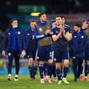 Andy Robertson of Scotland applauds the fans with team-mates following defeat to Croatia on Tuesday night (Pic by Stu Forster/Getty Images)