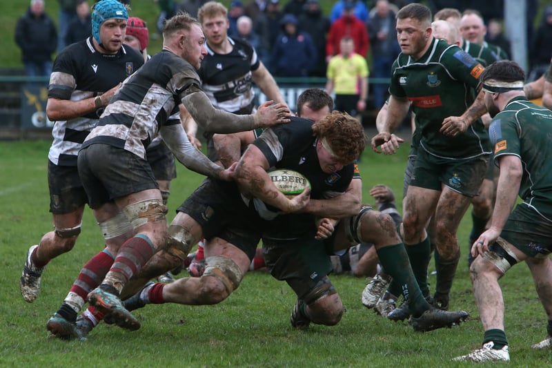 Keith Melbourne being tackled by Dalton Redpath during Hawick's 25-9 win against Kelso at home at Mansfield Park on Saturday in this year's Scottish Premiership semi-final play-offs (Photo: Steve Cox)