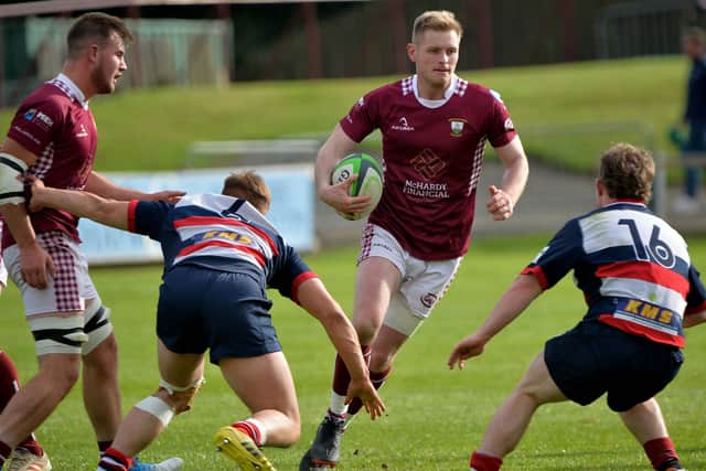 Gala try-scorer Keith Young going past Aberdeen Grammar's Jonathan Spence and Glen Robertson at Netherdale on Saturday (Pic: Alwyn Johnston)
