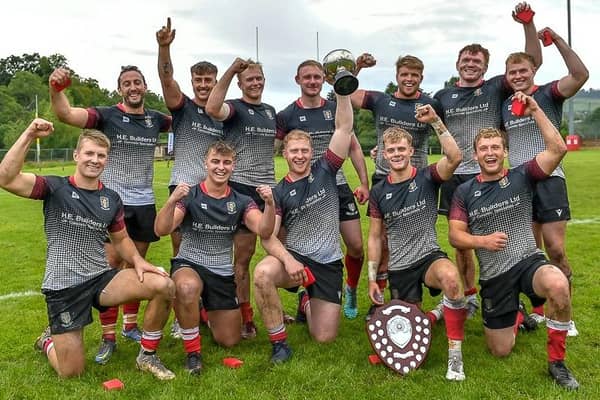 Kelso celebrating winning Saturday's Peebles Sevens, their first tournament win there since 1998