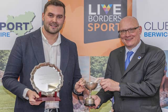 Duns rally driver Garry Pearson being given his award for ClubSport Berwickshire's sports personality of the year by Live Borders sports development manager John McBay