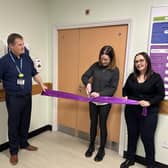 The cutting of the ribbon to unveil the new room - L-R: Ralph Roberts (NHS Borders Chief Executive), Fiona Lindsay (a parent supported by SiMBA) and Sara Fitzsimmons (Founder of the SiMBA charity and former CEO)