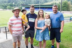 Chris Laidlaw, third left, with his family before the run. From left, uncle Roy, son Struan, wife Alanah, daughter Ivy and brother Scott. It's still to be confirmed but Chris hopes to do his August marathon in Edinburgh and his September run in East Lothian (picture by Bill McBurnie)