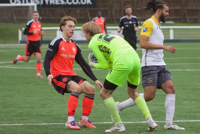 Lewis Hall challenging visiting goalkeeper Owen Hayward during Gala Fairydean Rovers’ 1-1 draw at home to Berwick Rangers on Saturday at Netherdale Stadium (Photo: Gala Fairydean Rovers)
