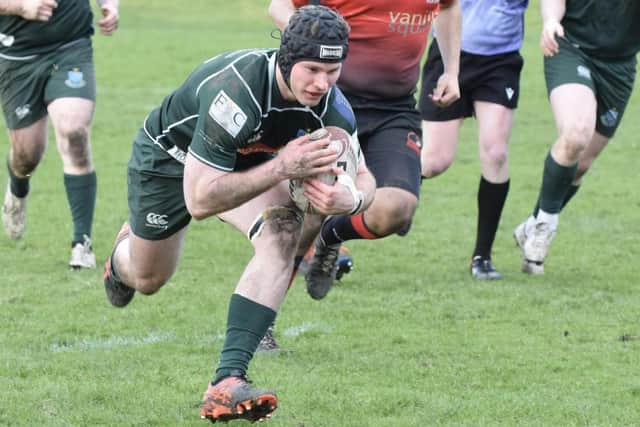 Ethan Reilly on his way to scoring one of his three tries for Hawick against Glasgow Hawks on Saturday (Pic: Malcolm Grant)