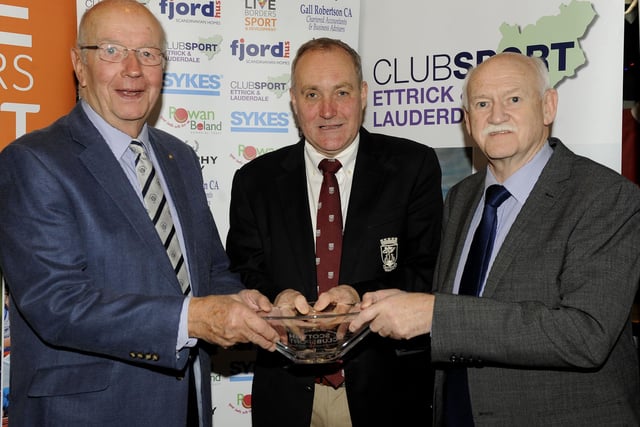 Steven Headspeath, centre, being presented with his Scottish Club Sport prize for services to sport by John Gray, left, and Rick Kenney