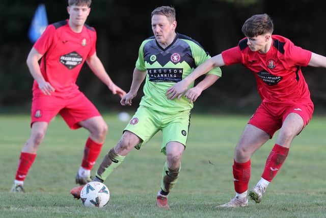 Des Sutherland on the ball for Langlee Amateurs during their 1-0 win away to Earlston Rhymers at Runciman Park on Saturday (Photo: Brian Sutherland)