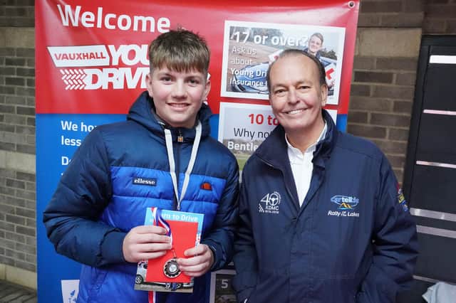 Scott Simpson  was presented with his certificate by TV presenter and driving expert Quentin Willson. (Photo: JANE COLLIER)