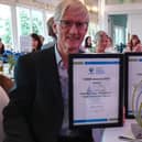 Tweed Forum trustee and University of Dundee Professor, Chris Spray, collects Tweed Forum’s awards.