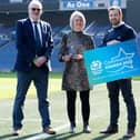 Kelso's Allison Whitson being presented with a Scottish Rugby community recognition award at Edinburgh's DAM Health Stadium (Photo: Ross Parker/SNS Group/SRU)