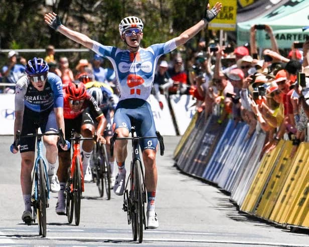 Team DSM-Firmenich PostNL rider Oscar Onley celebrating winning the fifth stage of 2024's Tour Down Under near Adelaide on Saturday (Pic: Brenton Edwards/AFP via Getty Images)