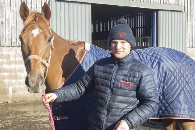 Hawick racehorse trainer Ewan Whillans with Kaizer, one of eight horses lined up to contest the feature race at Kelso tomorrow (Photo: Bill McBurnie)