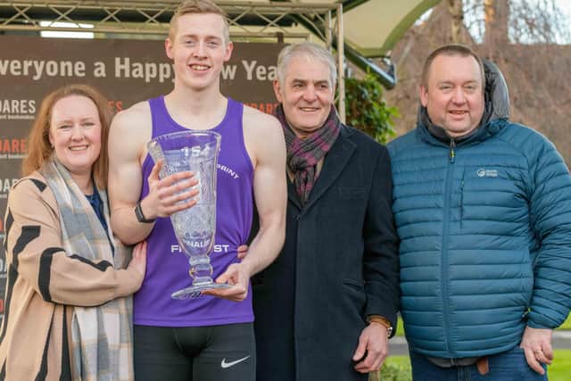 Scott Tindle celebrating after winning the 2023 Edinburgh new year sprint in East Lothian with coach Bruce Scott, centre right, and parents Eleanor and Paul (Pic: Alan Raeburn)