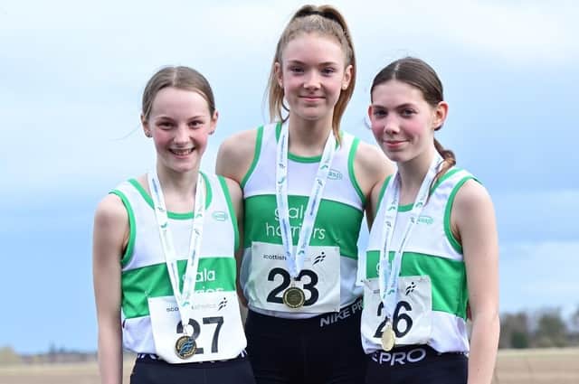 From left, gold medal-winning Gala Harriers Ava Richardson, Erin Gray and Kirsty Rankine at Saturday's youth road races at East Fortune racing circuit