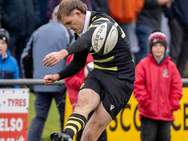 Fly-half Luke Townsend taking a kick for Melrose as they lost 39-22 away to Kelso at Poynder Park on Saturday (Photo: Andy McLean)