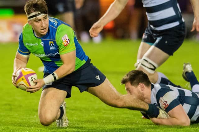 Boroughmuir Bears' Rhys Tait being tackled by Heriot's Ruaridh Leishman during their sides' Fosroc Super6 match in Edinburgh last Friday  (Photo by Mark Scates/SNS Group/SRU)