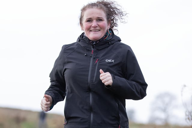 A woman taking part in Lauderdale Limpers and Gala Harriers' social run from Tweedbank to Lauder on Tuesday