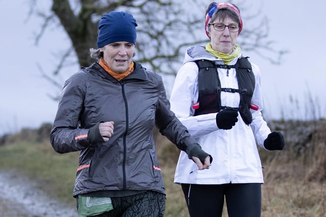 Two runners taking part in Lauderdale Limpers and Gala Harriers' social outing from Tweedbank to Lauder on Tuesday