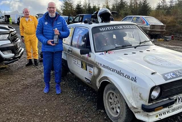 Alistair Brearley, front, and co-driver Gerry Bryden celebrating their double win in this year's Motorsport UK Scottish Rally Championship