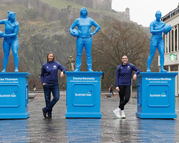 From left, Lisa Thomson, Donna Kennedy and Francesca McGhie in Edinburgh's Castle Street with their blue plastic statues intended to inspire more girls to take up rugby (Pic: Robert Perry/PinPep)