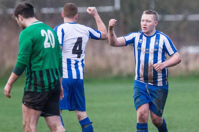 Jed Legion's Stephen Davidson being congratulated by Barry Melrose after scoring a penalty against Hawick Legion on Saturday (Photo: Bill McBurnie)
