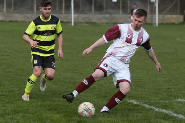 Fraser Brown helping Langlee Amateurs beat Stow 2-0 in the Border Amateur Football Association's A division on Saturday to go four points clear of Duns Amateurs at the top of the table (Photo: Steve Cox)