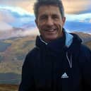 Ex-Scotland football international John Collins on his way up Ben Nevis to help raise funds for an op appeal for Gala Fairydean Rovers defender Ben Herdman (Photo: Norrie Collins)