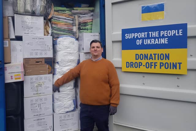 Grant Hamilton with the second full container at Love My Beds, ready for shipment to Ukraine.
