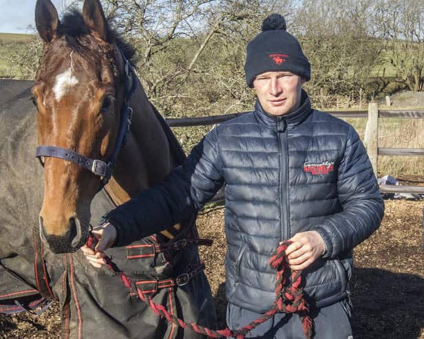 Hawick racehorse trainer Ewan Whillans with Tartan Cookie, another of his horses (Pic: Bill McBurnie)