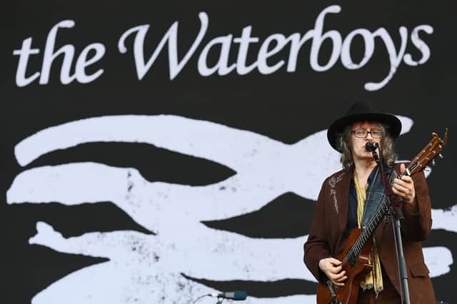 Waterboys frontman Mike Scott playing at the Isle of Wight Festival in 2014 (Photo by Tim P Whitby/Getty Images)