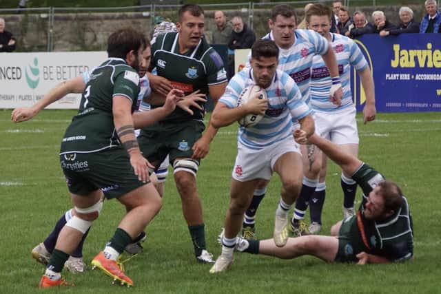 Hawick trying to thwart an Edinburgh Academical attack at Raeburn Place on Saturday en route to a 13-12 away victory (Photo: John Wright)