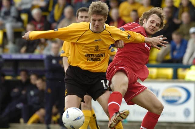 Lee Makel in action for Livingston against Aberdeen. He denies charges which allege he sent abusive texts to his wife.